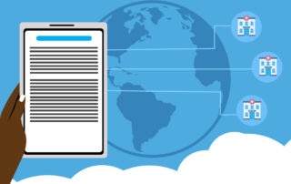 Hand holding tablet in front of globe