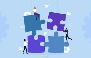 People shoving puzzle pieces together to symbolize site feasibility process